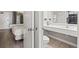 Clean bathroom with a white vanity and a view into a bedroom, providing convenience and functionality at 1501 South Ocean Blvd. # 643, Myrtle Beach, SC 29577