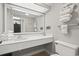 A clean white bathroom features plenty of counter space and towel racks at 1501 South Ocean Blvd. # 643, Myrtle Beach, SC 29577