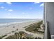 High-angle view of beach showing beach access, volleyball, and spa near condos at 1501 South Ocean Blvd. # 643, Myrtle Beach, SC 29577