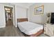 Bedroom featuring closet, TV stand and access to bathroom at 1501 South Ocean Blvd. # 643, Myrtle Beach, SC 29577
