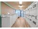 Clean laundry room with multiple washing machines, providing convenience for guests during their stay at 1501 South Ocean Blvd. # 643, Myrtle Beach, SC 29577