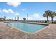 Expansive outdoor pool surrounded by lounge chairs and palm trees, ideal for soaking up the sun and enjoying the scenery at 1501 South Ocean Blvd. # 643, Myrtle Beach, SC 29577
