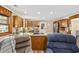 Kitchen with granite counters and breakfast bar open to the living area at 153 Busbee St., Conway, SC 29526