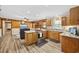 Open concept living room and kitchen area with modern appliances and wood accents at 153 Busbee St., Conway, SC 29526