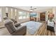 Comfortable living room featuring a ceiling fan, neutral walls, and wood flooring at 153 Busbee St., Conway, SC 29526