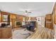Inviting living area with fireplace, comfortable seating, and access to the kitchen at 153 Busbee St., Conway, SC 29526