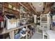 Organized storage area with shelves, tools, and a laundry area with a washer and dryer at 153 Busbee St., Conway, SC 29526