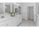 Spacious bathroom with double sinks, elegant countertops, and modern fixtures, designed for convenience at 1546 Villena Dr., Myrtle Beach, SC 29579