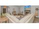 An open-concept living room with fireplace, neutral decor, and lots of natural light at 1546 Villena Dr., Myrtle Beach, SC 29579