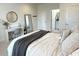 Bright main bedroom features a desk, mirror, closet and ensuite bathroom at 1546 Villena Dr., Myrtle Beach, SC 29579