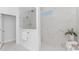 Sleek shower featuring marble tiling, glass enclosure, and modern fixtures, adding a touch of luxury at 1546 Villena Dr., Myrtle Beach, SC 29579