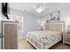 This bright bedroom features a large window, ocean views, and coastal decor at 1611B S Ocean Blvd., Surfside Beach, SC 29575
