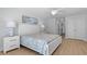 Bright and airy bedroom featuring a large bed and coastal inspired decor at 1611B S Ocean Blvd., Surfside Beach, SC 29575