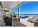 Relax on the deck in comfortable seating while enjoying stunning ocean views and a private pool at 1611B S Ocean Blvd., Surfside Beach, SC 29575