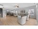 Spacious living room featuring hardwood floors, a large sectional, and stylish decor at 1611B S Ocean Blvd., Surfside Beach, SC 29575