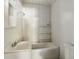 Modest white bathroom featuring a combination shower and bathtub, and a single sink at 1800 9Th Ave., Conway, SC 29527