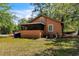 Side angle of a home featuring a ramp and a screened in porch at 1800 9Th Ave., Conway, SC 29527