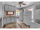 Kitchen showing sink, appliances, and exterior access at 1800 9Th Ave., Conway, SC 29527