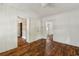 Bright living room showing multiple doorways and wood-look floors at 1800 9Th Ave., Conway, SC 29527