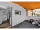 Enclosed back porch showing access to the kitchen and yard at 1800 9Th Ave., Conway, SC 29527