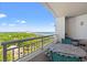 A spacious balcony with seating offering views of the ocean and surrounding landscape at 215 77Th Ave. N # 807, Myrtle Beach, SC 29572
