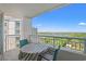 Relax on the balcony with seating and a stunning view of the neighborhood at 215 77Th Ave. N # 807, Myrtle Beach, SC 29572