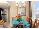 Cozy dining space with a glass table and scenic views through the window at 215 77Th Ave. N # 807, Myrtle Beach, SC 29572