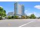 A multi-story condominium building in a coastal area with landscaping at 215 77Th Ave. N # 807, Myrtle Beach, SC 29572