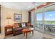 A comfortable living room with balcony access offering scenic views at 215 77Th Ave. N # 807, Myrtle Beach, SC 29572