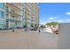 Enjoy a relaxing day at the pool with views of the building's wrap around balconies at 215 77Th Ave. N # 807, Myrtle Beach, SC 29572