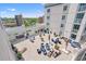 Rooftop terrace is furnished with tables, chairs, and tanning beds at 215 77Th Ave. N # 807, Myrtle Beach, SC 29572