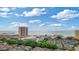Stunning aerial view capturing the coastline, a pier, a high-rise condo, and a charming neighborhood at 223 Maison Dr. # C7, Myrtle Beach, SC 29572