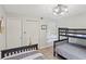 Well-lit bedroom featuring a bunk bed and twin bed with a ceiling fan at 223 Maison Dr. # C7, Myrtle Beach, SC 29572
