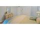 Bright bedroom showcasing a large bed and classic furnishings at 223 Maison Dr. # C7, Myrtle Beach, SC 29572