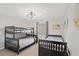 Bedroom featuring a bunk bed, twin bed, window and modern lighting at 223 Maison Dr. # C7, Myrtle Beach, SC 29572