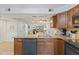 Kitchen area offering granite countertops, stainless steel appliances, and a pass-through view to the living area at 223 Maison Dr. # C7, Myrtle Beach, SC 29572