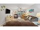 Bright and airy living room featuring a flat-screen TV and coastal decor at 223 Maison Dr. # C7, Myrtle Beach, SC 29572