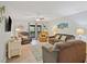 Cozy living room with comfortable seating and a view of the balcony at 223 Maison Dr. # C7, Myrtle Beach, SC 29572