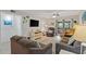 Relaxing living room with a ceiling fan and access to the balcony at 223 Maison Dr. # C7, Myrtle Beach, SC 29572