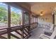 Relaxing screened porch with comfortable seating and views of the pool at 223 Maison Dr. # C7, Myrtle Beach, SC 29572