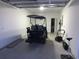 Spacious garage with golf cart and ample room for storage and parking at 223 S 9Th Ave. S, North Myrtle Beach, SC 29582