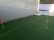 Backyard putting green for at-home golf practice and outdoor recreation near the pool at 223 S 9Th Ave. S, North Myrtle Beach, SC 29582