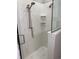 Modern shower featuring sleek marble-style wall surround and chrome fixtures at 223 S 9Th Ave. S, North Myrtle Beach, SC 29582