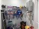 Organized storage room with shelving and various household items, including beach chairs at 223 S 9Th Ave. S, North Myrtle Beach, SC 29582