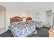 Inviting bedroom features two beds with decorative bedding, lamps, and a door leading to the bathroom and closet at 2300 N Ocean Blvd. # 1430, Myrtle Beach, SC 29577