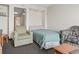Living area with a chair and bed in the background at 2300 N Ocean Blvd. # 1430, Myrtle Beach, SC 29577