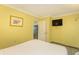 Comfortable bedroom with a compact kitchenette, ideal for quick meals and relaxation after a day of exploration at 2301 S Ocean Blvd. # 130, Myrtle Beach, SC 29577