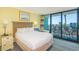 Comfortable hotel room with a large bed, balcony, and a view of the resort pool at 2301 S Ocean Blvd. # 130, Myrtle Beach, SC 29577