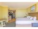 Bright bedroom featuring a cozy dining set, full kitchenette, and comfortable bed for a relaxing stay at 2301 S Ocean Blvd. # 130, Myrtle Beach, SC 29577
