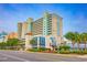Impressive condo building with a blend of architectural styles providing a tropical, resort-style living at 2301 S Ocean Blvd. # 130, Myrtle Beach, SC 29577